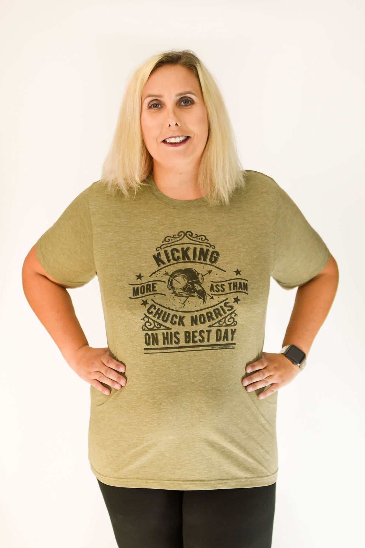 Kicking More Ass Than Chuck Norris Exclusive Graphic T by Fashion Freak LLC | Unisex Olive Green